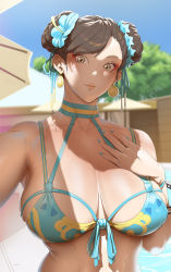 Rule 34 | 1girl, bare shoulders, bikini, blue nails, blue sky, blurry, blurry foreground, bracelet, breasts, brown eyes, brown hair, capcom, chun-li, cleavage, closed mouth, collarbone, double bun, earrings, eyeshadow, flower, hair bun, hair flower, hair ornament, hand on own chest, ion (cation), jewelry, large breasts, makeup, nail polish, outdoors, outstretched arm, pink lips, pool, sky, stomach, street fighter, swept bangs, swimsuit, tree, umbrella, water