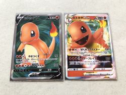 Rule 34 | blue eyes, card, card (medium), character name, character print, charmander, closed mouth, commentary request, creatures (company), fangs, fire, flame-tipped tail, game freak, gen 1 pokemon, highres, nintendo, official style, open mouth, pokemon, pokemon tcg, pokeyugami, tongue, translation request