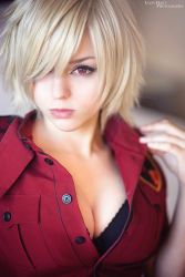 Rule 34 | 1girl, alternate costume, blonde hair, breasts, cleavage, closed mouth, cosplay, female focus, hellsing, large breasts, looking at viewer, photo (medium), police, police uniform, red eyes, seras victoria, serious, short hair, solo, stephanie fischer, uniform, upper body, vampire