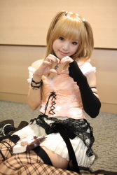 Rule 34 | 1girl, amane misa, amane misa (cosplay), asian, bare shoulders, blonde hair, breasts, choker, cosplay, cross, death note, elbow gloves, fingerless gloves, fishnet thighhighs, fishnets, gloves, hair ornament, heart, heart hands, highres, indoors, jewelry, kipi-san, lace, long hair, looking at viewer, miniskirt, mole, pendant, photo (medium), ring, single glove, sitting, skirt, skull and crossbones, skull hair ornament, skull ring, small breasts, smile, solo, thighhighs, two side up, wariza