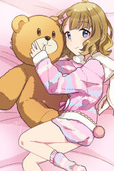 Rule 34 | 1girl, ahoge, bear tail, bed sheet, blue eyes, blush, bow, brown hair, commentary, fake tail, hair bow, hug, idolmaster, idolmaster million live!, idolmaster million live! theater days, koma tori, long sleeves, looking at viewer, lying, medium hair, official alternate costume, on bed, pajamas, pink bow, pink pajamas, pink shorts, pink socks, shorts, sidelocks, signature, smile, socks, solo, stuffed animal, stuffed toy, suou momoko, tail, teddy bear, wavy hair