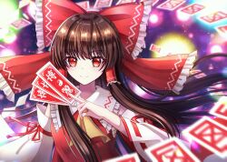 1girl absurdres ascot between_fingers blurry bow brown_hair closed_mouth commentary_request danmaku depth_of_field detached_sleeves frilled_bow frilled_hair_tubes frills gohei hair_bow hair_tubes hakurei_reimu highres holding long_hair looking_at_viewer ofuda ofuda_between_fingers red_bow red_eyes ribbon-trimmed_sleeves ribbon_trim rina_sukareltuto smile solo touhou very_long_hair yellow_ascot yin_yang yin_yang_print