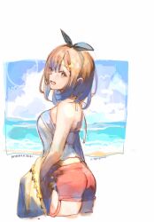 1girl ass atelier_(series) atelier_ryza bare_shoulders beach black_hairband border bow_hairband breasts brown_eyes brown_hair cloud cloudy_sky commentary crop_top cropped_legs from_behind hair_between_eyes hair_ornament hairband hairclip halterneck highres large_breasts le21day looking_at_viewer medium_hair ocean open_mouth outdoors outside_border red_shorts reisalin_stout shirt short_shorts shorts sideways_mouth sky solo symbol-only_commentary twitter_username watermark white_border white_shirt