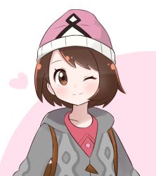 Rule 34 | 1girl, ;), backpack, bag, beanie, blush, bob cut, brown eyes, brown hair, cardigan, closed mouth, commentary, creatures (company), game freak, gen 7 pokemon, gloria (pokemon), grey cardigan, hat, heart, highres, hooded cardigan, ixia (ixia424), legendary pokemon, looking at viewer, nintendo, one eye closed, pink background, pink hat, pink shirt, pokemon, pokemon swsh, shirt, short hair, smile, solo, tapu lele, themed object, two-tone background, upper body, white background