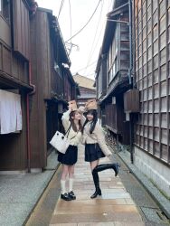 Rule 34 | 2girls, black skirt, highres, japanese house, koizumi kanon, multiple girls, photo (medium), sakimoto mio, skirt, socks, white socks