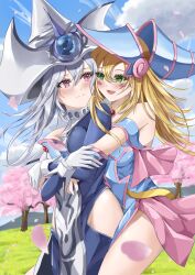 Rule 34 | 2girls, absurdres, bare shoulders, blonde hair, blue dress, blue hat, blue robe, blush, blush stickers, breasts, capelet, cherry blossoms, commentary request, dark magician girl, dress, duel monster, gloves, grass, green eyes, grey hair, hat, highres, hip vent, hug, hug from behind, large breasts, long hair, looking at another, medium breasts, misakura aoi, multiple girls, nature, outdoors, petals, pink capelet, red eyes, req, robe, silent magician, tree, white gloves, white hat, witch hat, yu-gi-oh!, yuri