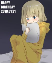 Rule 34 | 1girl, bed, blonde hair, blue eyes, blush, closed mouth, commentary request, dated, english text, fuji (fuji mount3333), girls und panzer, happy birthday, holding, hood, hoodie, katyusha (girls und panzer), long sleeves, night, hugging object, on bed, pajamas, pants, partial commentary, pillow, pillow hug, shirt, short hair, sitting, smile, solo, yellow pants, yellow shirt