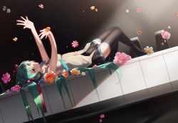 Rule 34 | 1girl, black background, black thighhighs, dutch angle, flower, from side, full body, green eyes, green hair, hatsune miku, long hair, lying, mini person, minigirl, necktie, on back, outstretched arms, piano keys, pleated skirt, skirt, solo, thighhighs, very long hair, vocaloid, yamai fake