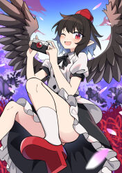 1girl bird_wings black_bow black_bowtie black_skirt blush bow bowtie brown_hair brown_wings camera collared_shirt commentary_request e.o. falling_petals feathered_wings flying geta hat highres holding holding_camera looking_at_viewer one_eye_closed open_mouth petals pink_petals pointy_ears puffy_short_sleeves puffy_sleeves red_eyes red_hat shameimaru_aya shirt short_sleeves skirt smile socks solo tengu-geta tokin_hat touhou white_shirt white_socks wings