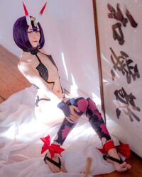 Rule 34 | 1girl, breasts, chilean (nationality), cosplay, day, fate/grand order, fate (series), feet, female focus, flat chest, highres, horns, indoors, photo (medium), pointy ears, purple eyes, purple hair, short hair, shuten douji (fate), sitting, skin-covered horns, small breasts, solo, toes, yashaowo