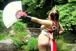 Rule 34 | 1girl, ass, backboob, breasts, brown eyes, brown hair, chouzuki maryou, cosplay, hand fan, hair ornament, huge ass, large breasts, long hair, photo (medium), plump, ponytail, rope, shiranui mai, shiranui mai (cosplay), snk, solo, the king of fighters, thick thighs, thighs, very long hair