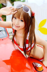 Rule 34 | 1girl, arm support, asian, bikini, blue eyes, breasts, car, color contacts, cosplay, eyewear on head, hairpods, kipi-san, leaning forward, long hair, looking at viewer, mole, motor vehicle, neon genesis evangelion, on vehicle, orange hair, outdoors, photo (medium), small breasts, smile, solo, souryuu asuka langley, souryuu asuka langley (cosplay), striped bikini, striped clothes, sunglasses, swimsuit, wet, wet hair, white-framed eyewear, zipper