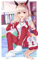 Rule 34 | 1girl, animal ears, blurry, blurry background, cellphone, curren chan (umamusume), evefly megane p, grey hair, highres, horse ears, horse girl, horse tail, jacket, long sleeves, looking at viewer, no shoes, open mouth, pants, phone, purple eyes, red jacket, red pants, selfie, sitting, socks, solo, tail, tracen training uniform, track jacket, track pants, track suit, umamusume, variant set, white socks