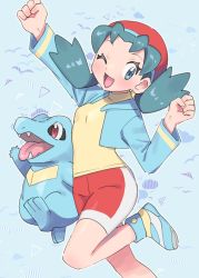 Rule 34 | 1girl, alternate color, alternate costume, aqua eyes, aqua hair, arm up, bike shorts, blue background, blue footwear, blue jacket, clenched hand, creatures (company), game freak, gen 2 pokemon, happy, highres, jacket, kris (pokemon), leg up, looking at viewer, nintendo, one eye closed, open mouth, pokemon, pokemon (creature), pokemon gsc, pumpkinpan, red headwear, red legwear, shirt, short twintails, smile, totodile, twintails, yellow shirt