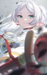 Rule 34 | 1girl, blurry, blurry foreground, capelet, commentary request, debris, earrings, elf, frieren, gem, gold trim, green eyes, grey background, high collar, holding, holding staff, jewelry, long hair, long sleeves, looking at viewer, mage staff, ouri (aya pine), parted bangs, parted lips, pointy ears, red gemstone, solo, sousou no frieren, staff, twintails, upper body, white capelet, white hair, wind