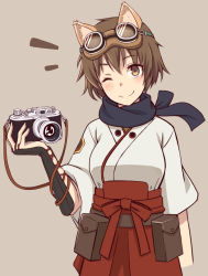 Rule 34 | 1girl, animal ears, blush, brown eyes, brown hair, camera, fox ears, goggles, goggles on head, japanese clothes, katou keiko, looking at viewer, momiji7728, one eye closed, scarf, short hair, simple background, smile, solo, tan background, witches of africa, world witches series