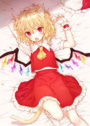 Rule 34 | 1girl, :o, animal ear fluff, animal ears, arms up, ascot, bed sheet, blonde hair, blush, cat ears, cat tail, commentary request, crystal, feet out of frame, flandre scarlet, frilled shirt collar, frills, from above, hair between eyes, hat, hat ribbon, honotai, kemonomimi mode, looking at viewer, lying, mob cap, on back, open mouth, petticoat, puffy short sleeves, puffy sleeves, red eyes, red ribbon, red skirt, red vest, ribbon, shirt, short hair, short sleeves, skirt, socks, solo, tail, touhou, unworn hat, unworn headwear, vest, white hat, white shirt, white socks, wings, wrist cuffs, yellow ascot