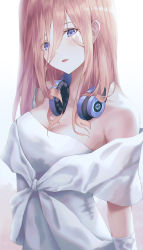 1girl bare_shoulders blue_eyes blush breasts cleavage dress eyes_visible_through_hair go-toubun_no_hanayome hair_between_eyes headphones headphones_around_neck highres long_hair looking_at_viewer medium_breasts moda_(mo_da_3) nakano_miku red_hair solo wedding_dress