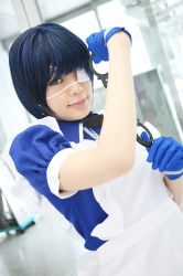 Rule 34 | 1girl, apron, asian, blue eyes, blue gloves, blue hair, collar, color contacts, cosplay, cross, cuffs, dutch angle, eyepatch, gloves, handcuffs, highres, ikkitousen, indoors, looking at viewer, maid, maid apron, namada, photo (medium), puffy short sleeves, puffy sleeves, ryomou shimei, ryomou shimei (cosplay), short sleeves, solo, standing