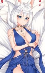 Rule 34 | 1girl, animal ears, arm under breasts, azur lane, bare shoulders, blue dress, blue eyes, blush, breasts, cleavage, dress, expressionless, fox ears, fox girl, fox tail, groin, hand on breast, hand on own chest, highres, kaga (azur lane), kaga (exalted white wings) (azur lane), kitsune, kurisu-kun, looking at viewer, lying, medium breasts, medium hair, midriff, multiple tails, no bra, no panties, official alternate costume, on back, on bed, sideless outfit, solo, tail, white hair