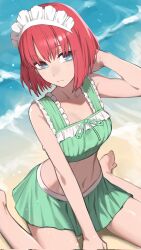 1girl beach bikini blue_eyes chorogon commentary_request commission frilled_bikini frills green_bikini green_skirt hand_on_own_neck highres hisui_(tsukihime) maid_headdress medium_hair navel red_hair sitting skeb_commission skirt solo swimsuit tsukihime wariza