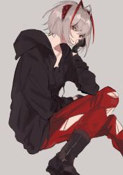 Rule 34 | 1girl, arknights, black gloves, black hoodie, boots, feet out of frame, gloves, grey background, hand on own cheek, hand on own face, highres, hood, hoodie, invisible chair, long sleeves, looking at viewer, marumarukin, multicolored hair, pants, red eyes, red pants, short hair, simple background, sitting, smile, solo, streaked hair, teeth, torn clothes, torn pants, w (arknights)