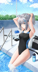 1girl absurdres animal_ear_fluff animal_ears arms_behind_head bare_shoulders blue_archive blue_eyes bottle breasts bright_pupils collarbone commentary competition_swimsuit cross_hair_ornament curvy day extra_ears eyelashes eyes_visible_through_hair feet_out_of_frame fence grey_hair groin gun hair_between_eyes hair_ornament hairdressing highleg highleg_one-piece_swimsuit highres looking_at_viewer medium_breasts medium_hair mismatched_pupils official_alternate_costume official_alternate_hairstyle one-piece_swimsuit outdoors parted_lips ponytail poolside shiroko_(blue_archive) sidelocks simplechip sitting soaking_feet solo swimsuit thighs weapon white_pupils wolf_ears