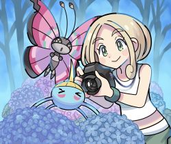 Rule 34 | &gt; &lt;, 1girl, belt, blonde hair, blush stickers, bug, butterfly, camera, closed mouth, commentary request, creatures (company), game freak, gen 3 pokemon, gen 6 pokemon, green eyes, green pants, green wristband, holding, holding camera, insect, nintendo, outdoors, pants, photographer, pokemon, pokemon (creature), pokemon xy, shirt, sleeveless, sleeveless shirt, smile, surskit, sutokame, viola (pokemon), vivillon, white belt, white shirt, wristband