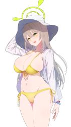 Rule 34 | 1girl, azegome, bikini, blue archive, breasts, cleavage, front-tie top, green eyes, halo, hand on headwear, hat, highres, large breasts, light brown hair, long hair, long sleeves, nonomi (blue archive), nonomi (swimsuit) (blue archive), official alternate costume, open clothes, open shirt, see-through, see-through shirt, side-tie bikini bottom, solo, standing, sun hat, swimsuit, yellow bikini