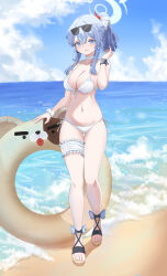 Rule 34 | 1girl, absurdres, ako (blue archive), beach, bikini, blue archive, blue eyes, blue hair, blue halo, blush, breasts, cake walker, commentary, day, english commentary, eyewear on head, front-tie bikini top, front-tie top, full body, hair between eyes, halo, highres, innertube, large breasts, long hair, looking at viewer, navel, ocean, open mouth, outdoors, sandals, side-tie bikini bottom, smile, solo, sunglasses, swim ring, swimsuit, white bikini