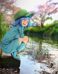Rule 34 | 1girl, blue eyes, blue footwear, blue hair, blue shirt, blue skirt, blurry, blurry background, boots, branch, breasts, bush, cherry blossoms, commentary request, concrete, d:, eyelashes, fishing, fishing rod, flanvia, flat cap, full body, grass, green hat, hair bobbles, hair ornament, hand on thighs, hat, heel up, highres, holding, holding branch, kawashiro nitori, long sleeves, looking at viewer, medium breasts, one side up, open mouth, outdoors, petals, petals on liquid, photo background, pipeline, pocket, pulling, river, rubber boots, shirt, skirt, smile, solo, squatting, teeth, tongue, touhou, tree, upper teeth only