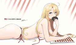 Rule 34 | 1girl, absurdres, ahoge, bikini, blonde hair, blue eyes, breasts, character name, doughnut, food, food in mouth, highres, iowa (kancolle), kantai collection, large breasts, long hair, looking at viewer, loose bikini, lying, odachu, on stomach, red bikini, sidelocks, solo, swimsuit, topless