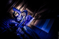 Rule 34 | 1girl, alley, batman (series), blonde hair, breathless-ness, cosplay, dc comics, dutch angle, hood, looking at viewer, outdoors, photo (medium), solo, spoiler (dc), stephanie brown