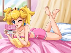 Rule 34 | 1girl, ass, barefoot, bed, blonde hair, blue eyes, blush, breasts, crown, earrings, feet, handheld game console, huge ass, jewelry, legs, lying, mario (series), nintendo, nintendo ds, on stomach, one eye closed, open mouth, pillow, playing games, princess peach, short shorts, shorts, sigurd hosenfeld, super mario bros. 1, the pose, toes, twintails, video game, wink