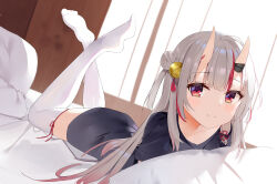Rule 34 | 1girl, absurdres, alternate costume, bell, black shirt, blush, commentary request, fang, gradient hair, grey hair, hair bell, hair ornament, highres, hololive, horns, long hair, looking at viewer, lying, multicolored hair, nakiri ayame, no shoes, on bed, on stomach, oni, pillow, red eyes, red hair, shirt, skin-covered horns, smile, solo, streaked hair, the pose, thighhighs, virtual youtuber, white thighhighs, zettai ryouiki, zhiyou ruozhe