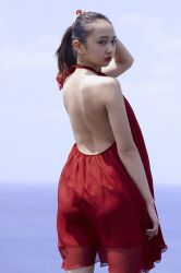 Rule 34 | 1girl, backless outfit, blurry, blurry background, dress, highres, komiya arisa, looking at viewer, open clothes, outdoors, photo (medium), ponytail, red dress, standing, voice actor