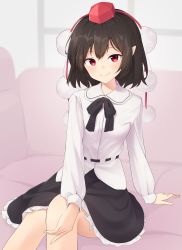 Rule 34 | 1girl, adapted costume, arm support, belt, black hair, black ribbon, black skirt, commentary, couch, feet out of frame, hand on own leg, hat, highres, indoors, kanpa (campagne 9), leaning to the side, long sleeves, looking at viewer, neck ribbon, petticoat, pointy ears, pom pom (clothes), red eyes, red hat, ribbon, shameimaru aya, shirt, short hair, sitting, skirt, smile, solo, tokin hat, touhou, untucked shirt, white shirt