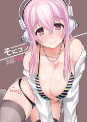 Rule 34 | 1girl, bikini, black thighhighs, blush, body writing, breasts, cleavage, cover, headphones, large breasts, long hair, looking at viewer, miyamoto issa, multicolored stripes, nitroplus, pink eyes, pink hair, shiny skin, skindentation, smile, solo, striped bikini, striped clothes, super sonico, swimsuit, thighhighs