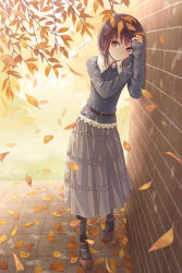 Rule 34 | 1girl, against wall, autumn, autumn leaves, belt, black legwear, brick wall, brown eyes, brown hair, falling leaves, frilled skirt, frills, full body, grey skirt, highres, leaf, long skirt, long sleeves, looking at viewer, mary janes, outdoors, photo-referenced, shoes, skirt, sleeves past wrists, solo, standing, tokumaru