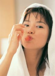 Rule 34 | 1girl, asian, brown hair, cherry, food, fruit, ichikawa yui, indoors, looking at viewer, mole, photo (medium), puckered lips, robe, solo, towel