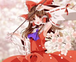 Rule 34 | 1girl, :d, arm up, armpits, ascot, blurry, blurry background, blush, bow, breasts, brown hair, cherry blossoms, commentary, cowboy shot, day, detached sleeves, frills, gohei, hair bow, hair tubes, hakurei reimu, holding, large bow, long hair, looking at viewer, nontraditional miko, okawa friend, open mouth, outdoors, parted bangs, petals, purple ascot, red bow, red eyes, red skirt, skirt, small breasts, smile, solo, touhou, wide sleeves, wind