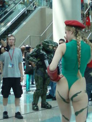 Rule 34 | ass, beret, blonde hair, braid, cammy white, cammy white (cosplay), capcom, cosplay, crystal graziano, halo, halo (series), hat, helmet, leotard, master chief, master chief (cosplay), pantyhose, patterned legwear, photo (medium), spandex, street fighter, twin braids