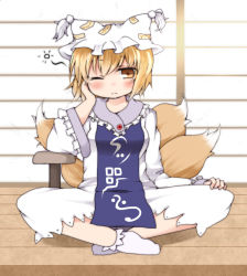 Rule 34 | 1girl, blonde hair, female focus, fox tail, hand on own cheek, hand on own face, hat, highres, indian style, multiple tails, nanana (chicken union), one eye closed, sitting, socks, solo, tail, touhou, white socks, wink, yakumo ran, yellow eyes