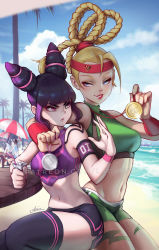 Rule 34 | 2girls, arm around shoulder, asia ladowska, beach, bike shorts, blonde hair, blue eyes, cammy white, clenched hand, commentary, cup, drinking straw, gold, han juri, headband, highres, jealous, medal, multiple girls, navel, ocean, purple eyes, purple hair, silver, sitting, smile, stomach, street fighter, street fighter ii (series), street fighter iv (series), thighhighs, water, wristband