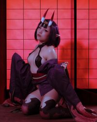 Rule 34 | 1girl, breasts, cosplay, fate/grand order, fate (series), female focus, highres, horns, indoors, kneeling, looking at viewer, medium breasts, mexican (nationality), photo (medium), pointy ears, purple eyes, purple hair, ruby blossom, short hair, shuten douji (fate), skin-covered horns, solo