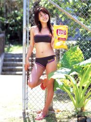 Rule 34 | 1girl, asian, bikini, blurry, breasts, chain-link fence, chips (food), depth of field, fence, flip-flops, food, happy, hasebe yu, lay&#039;s (potato chips), photo (medium), potato chips, sandals, small breasts, smile, solo, standing, standing on one leg, strapless, strapless bikini, swimsuit, tube top