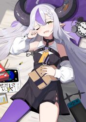 Rule 34 | 1girl, absurdres, ahoge, bare shoulders, black horns, black nails, book, braid, braided bangs, breasts, clock, crayon, drooling, grey hair, highres, hololive, horns, la+ darknesss, la+ darknesss (1st costume), long hair, looking at viewer, lying, manjirou (manji illust), multicolored hair, nail polish, nintendo switch, on back, one eye closed, open mouth, pointy ears, purple hair, small breasts, solo, streaked hair, striped horns, virtual youtuber, yellow eyes