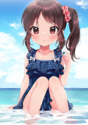 Rule 34 | 1girl, alternate hairstyle, arm support, bare shoulders, blue one-piece swimsuit, blue sky, blush, breasts, brown eyes, brown hair, cloud, collarbone, day, dot nose, frilled one-piece swimsuit, frills, gem, hair ornament, hair scrunchie, hand up, holding, holding gem, idolmaster, idolmaster cinderella girls, idolmaster cinderella girls starlight stage, knees together feet apart, long hair, looking at viewer, ocean, one-piece swimsuit, outdoors, parted lips, partially submerged, polka dot, polka dot swimsuit, red scrunchie, scrunchie, shima(kanidess), side ponytail, sitting, sky, small breasts, solo, swimsuit, tachibana arisu, wet