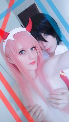 Rule 34 | 10s, 1boy, 1girl, black hair, blue eyes, breasts, clothed male nude female, collar, cosplay, couple, darling in the franxx, grabbing, grabbing another&#039;s breast, grabbing from behind, green eyes, hair ornament, hair over breasts, hairband, hetero, hiro (darling in the franxx), horns, long hair, looking at viewer, medium breasts, necktie, nude, oni horns, photo (medium), pink hair, red horns, red neckwear, shirt, short hair, white hairband, white shirt, zero two (darling in the franxx)