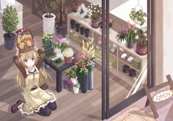Rule 34 | 1girl, apron, arms up, black pants, blush, brown eyes, brown footwear, brown hair, brown shirt, closed mouth, collarbone, english text, flower, flower basket, hair flower, hair ornament, holding, looking at viewer, on floor, original, pants, plant, potted plant, scissors, shirt, shoes, sign, sitting, sliding doors, smile, solo, table, wainscoting, wariza, wooden floor, yakka